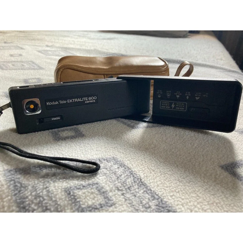Kodak 600 camera with vintage leather camera case